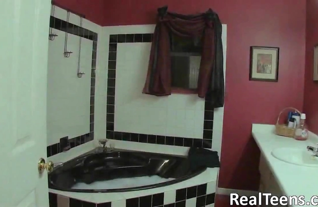 Redhead bitch fingers her pussy in the shower until she moans and cums